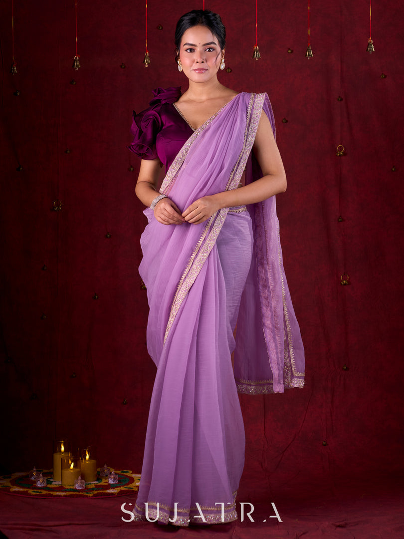 Soft Lavender Crepe Saree Adorned with Delicate Embroidered Lace Border