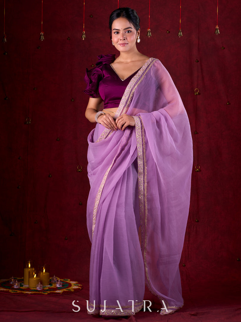 Soft Lavender Crepe Saree Adorned with Delicate Embroidered Lace Border
