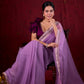 Soft Lavender Crepe Saree Adorned with Delicate Embroidered Lace Border