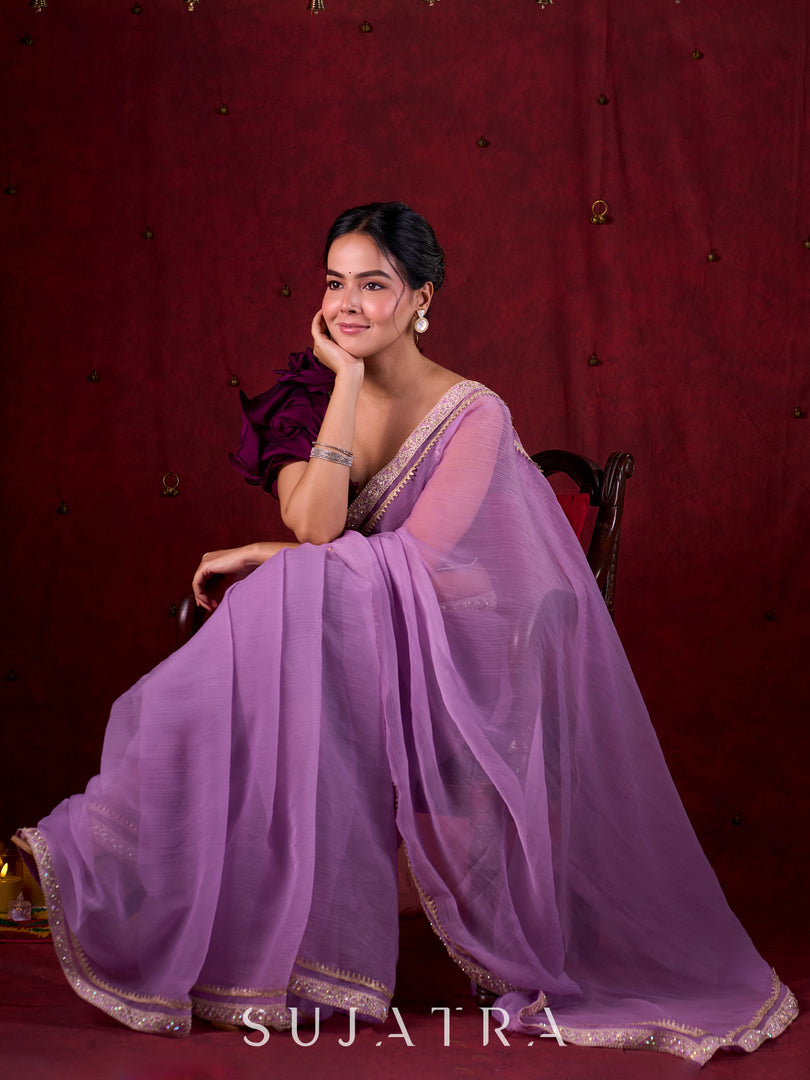 Soft Lavender Crepe Saree Adorned with Delicate Embroidered Lace Border