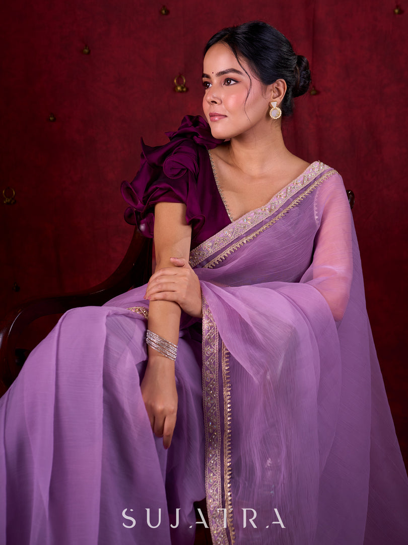 Soft Lavender Crepe Saree Adorned with Delicate Embroidered Lace Border