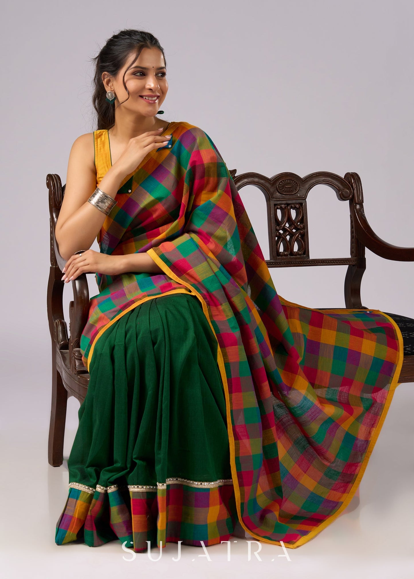 Festive plaid cotton saree in green, orange, and yellow tones