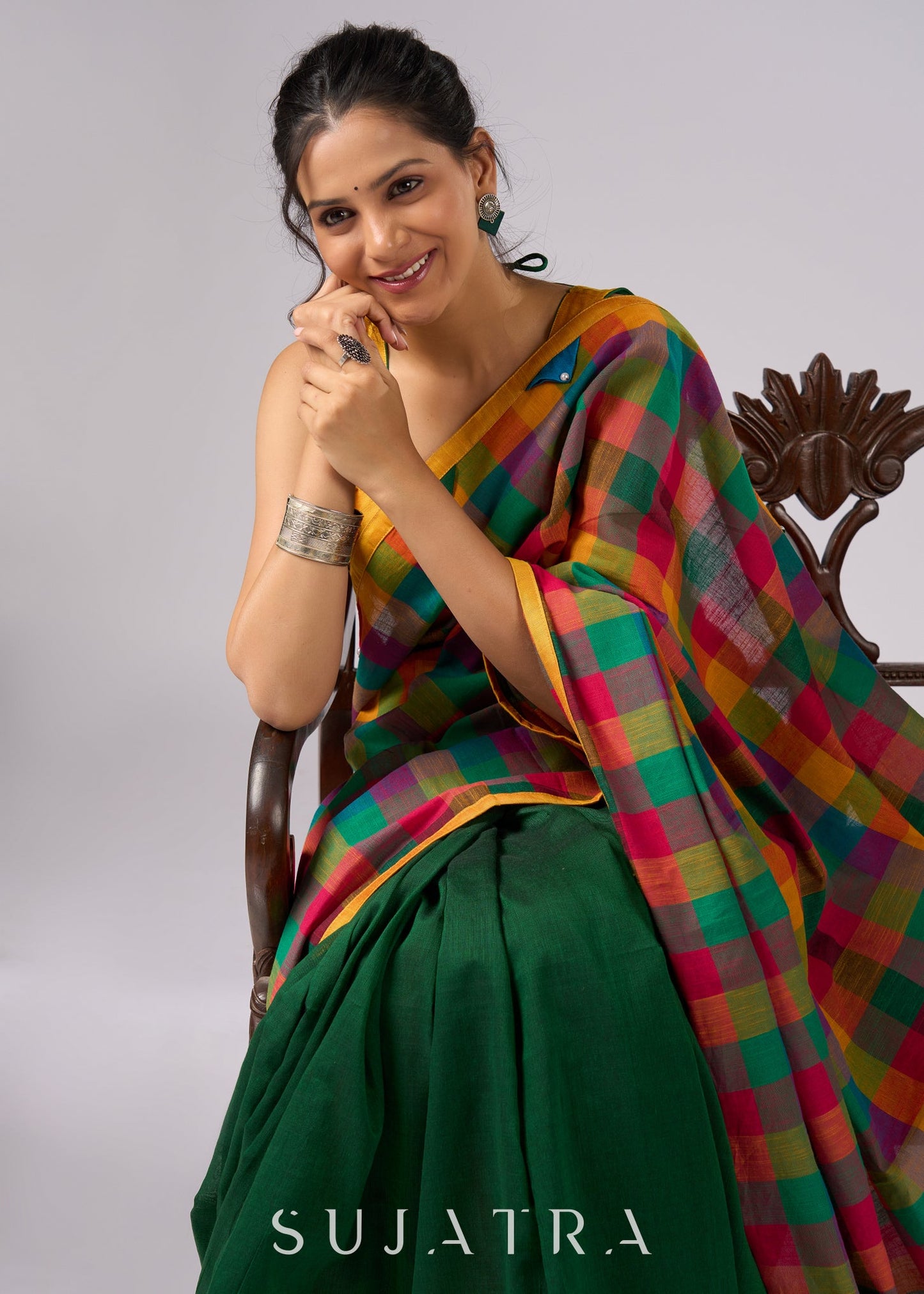 Festive plaid cotton saree in green, orange, and yellow tones