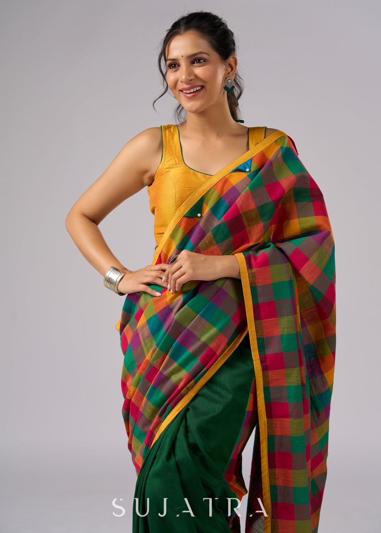 Festive plaid cotton saree in green, orange, and yellow tones
