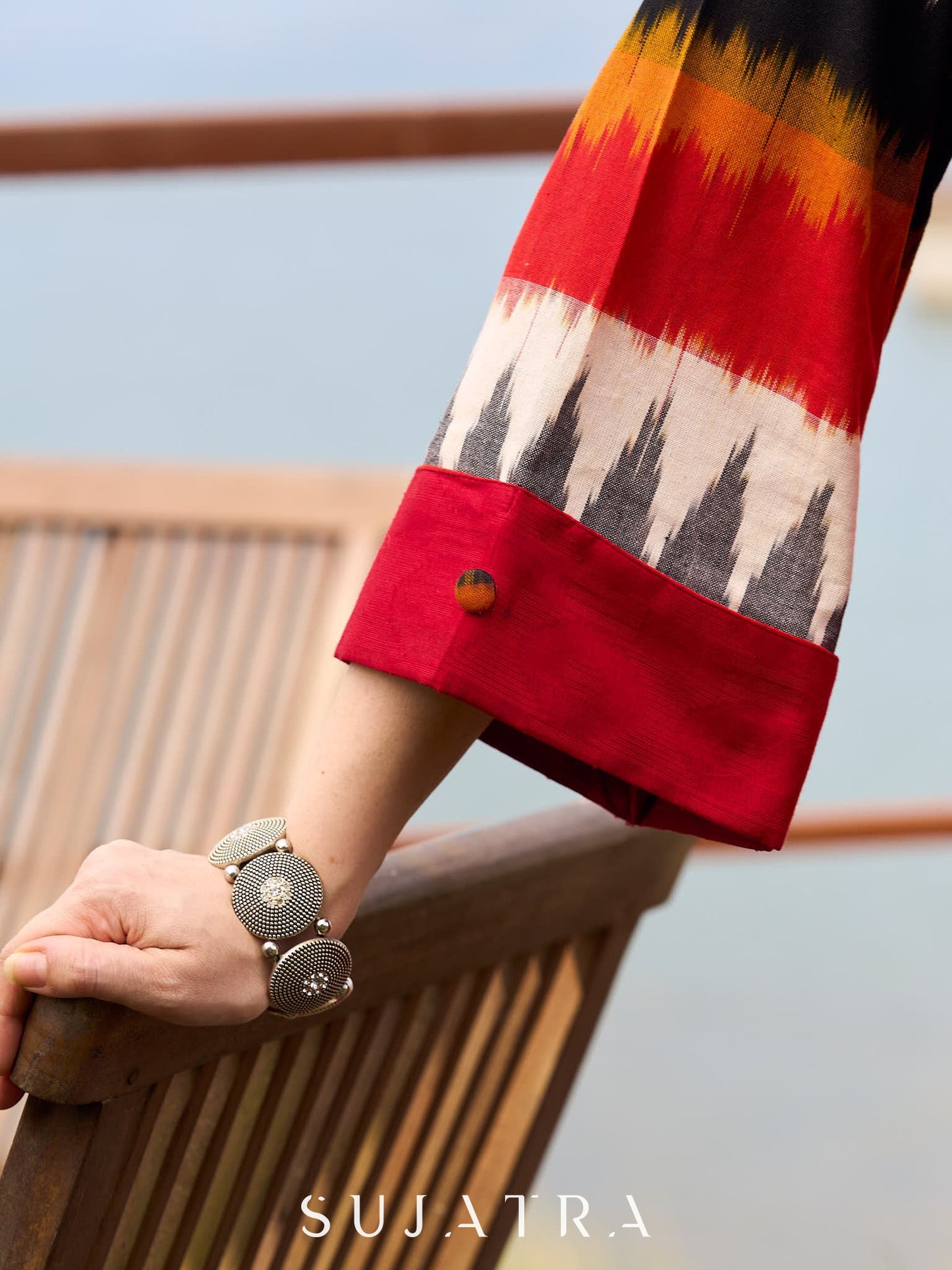 Elegant Red Cotton Jamdani Kurta with Complementing Ikat Patterned Sleeves and Front Pleat Details