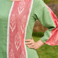 Subtle Pista Cotton Kurta featuring Asymmetric Peach Ikat Border Detailing