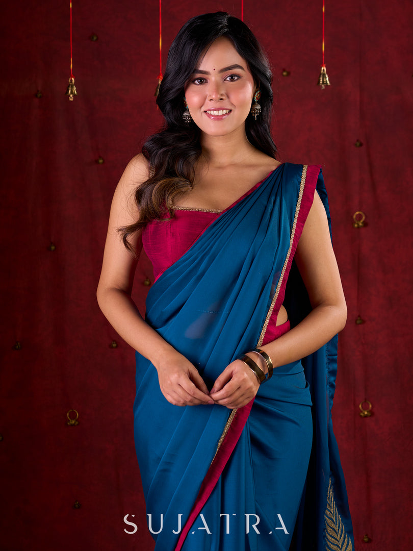 Deep Teal Silk Blend Saree Adorned with Magenta Border & Intricately Embroidered Pallu
