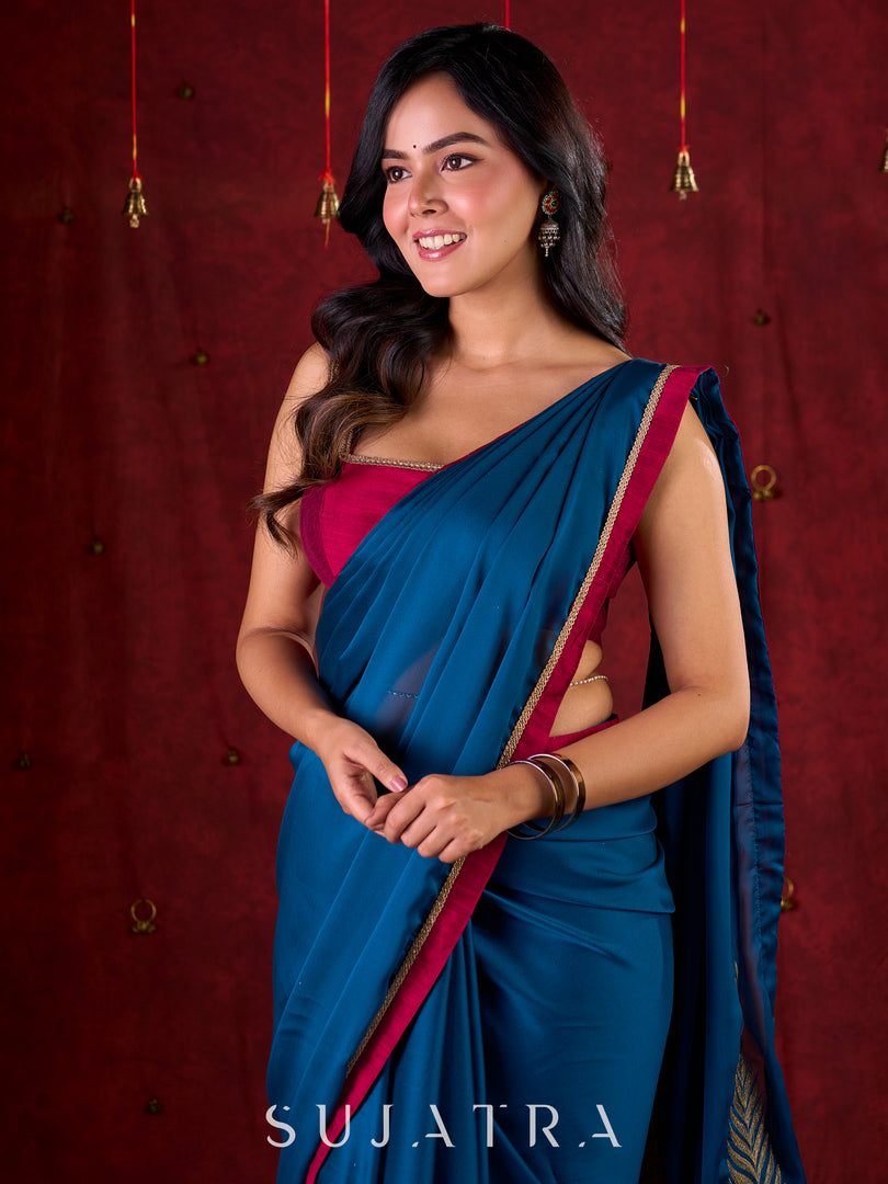 Deep Teal Silk Blend Saree Adorned with Magenta Border & Intricately Embroidered Pallu