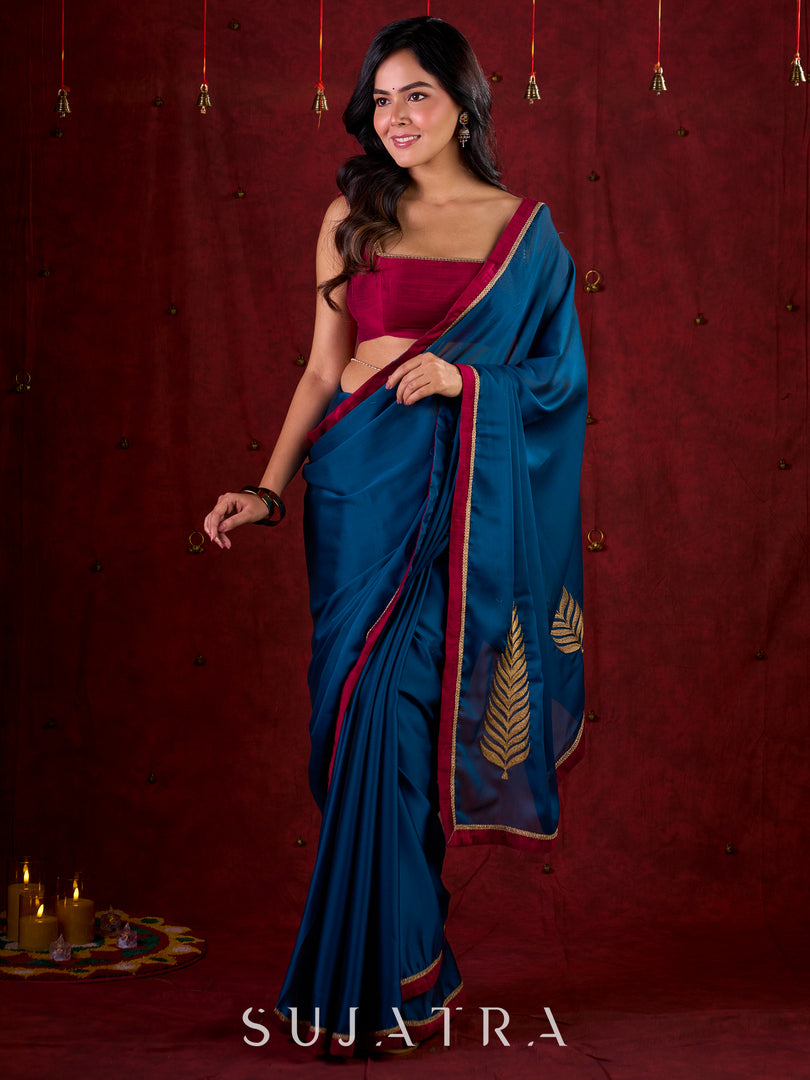 Deep Teal Silk Blend Saree Adorned with Magenta Border & Intricately Embroidered Pallu
