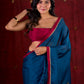 Deep Teal Silk Blend Saree Adorned with Magenta Border & Intricately Embroidered Pallu