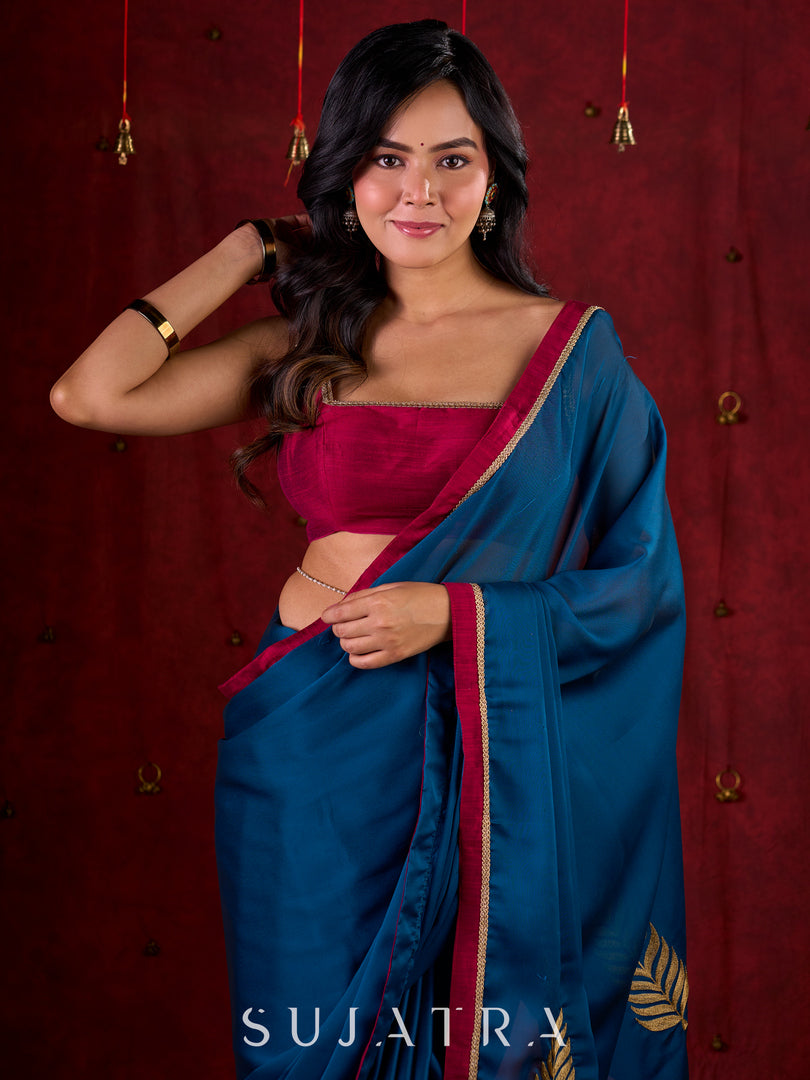Deep Teal Silk Blend Saree Adorned with Magenta Border & Intricately Embroidered Pallu