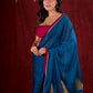Deep Teal Silk Blend Saree Adorned with Magenta Border & Intricately Embroidered Pallu