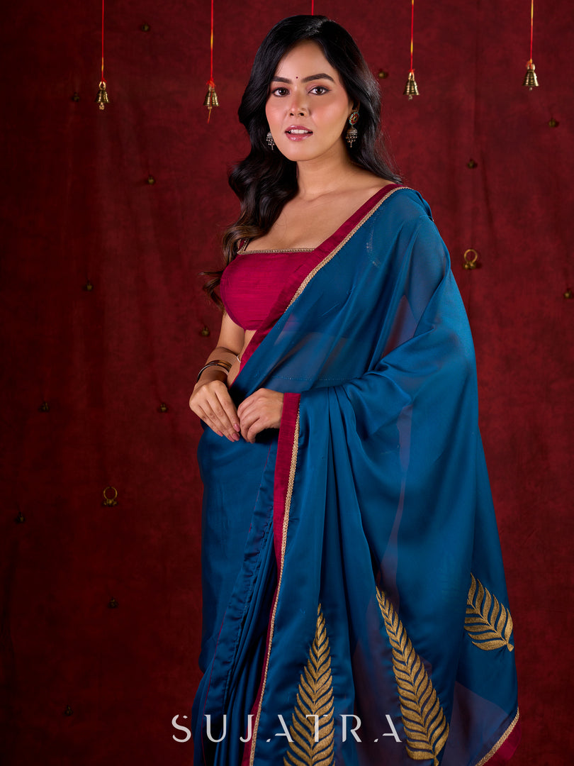 Deep Teal Silk Blend Saree Adorned with Magenta Border & Intricately Embroidered Pallu