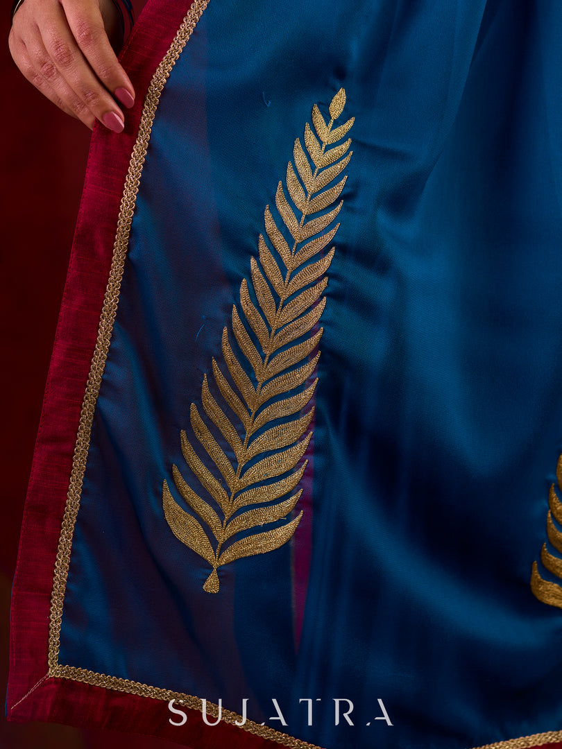 Deep Teal Silk Blend Saree Adorned with Magenta Border & Intricately Embroidered Pallu