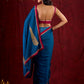 Deep Teal Silk Blend Saree Adorned with Magenta Border & Intricately Embroidered Pallu