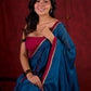 Deep Teal Silk Blend Saree Adorned with Magenta Border & Intricately Embroidered Pallu