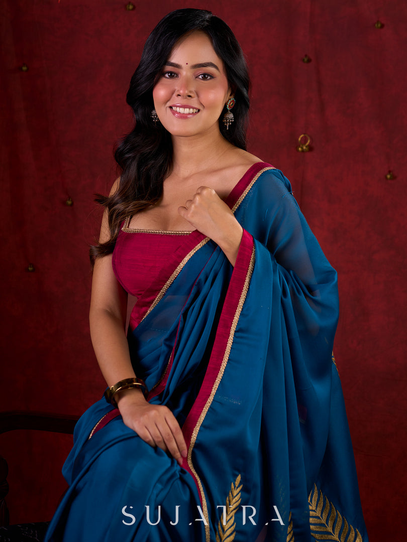 Deep Teal Silk Blend Saree Adorned with Magenta Border & Intricately Embroidered Pallu