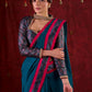 Turquoise Elegance Printed Blouse with Halter Neck, Full Sleeves & Minimal Detailing