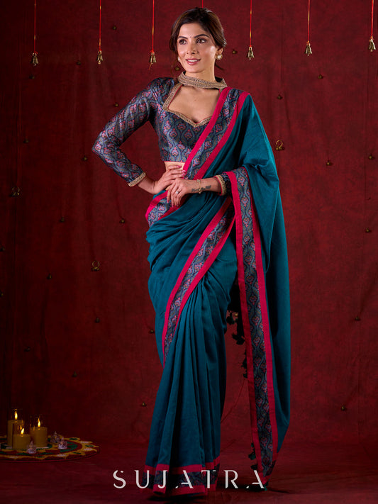 Ocean Turquoise Cotton Saree with Subtle Printed Border and Silk Pink Highlights