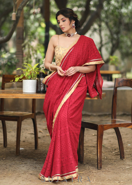Beautiful Maroon Embroidered Georgette Saree with Golden & Lace Detailing