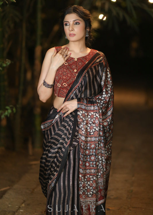 Lustrous Black Modal Silk Saree with Striped Pattern