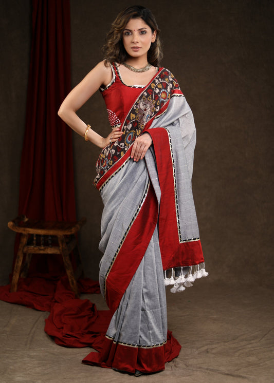 Soothing Cloud Grey Sequence Saree with Kalamkari Border Highlighted with Gota-Patti Lace