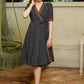 Trendy Black Ikat Overlap Dress Highlighted with Matching Ikat Border
