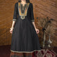 Plain black cotton silk kurta with heavy hand embroidered yoke & ikat palazzo pants - Dupatta optional.