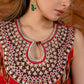 Exclusive sleeveless ikat kurta with heavy hand embroidery on neckline.