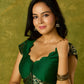 Festive dark green cap sleeve blouse with rich Banarasi combination
