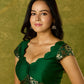 Festive dark green cap sleeve blouse with rich Banarasi combination