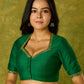 Gracefully hand embroidered forest green cotton silk blouse.