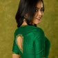 Gracefully hand embroidered forest green cotton silk blouse.
