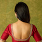 Festive hand embroidered maroon cotton silk blouse.