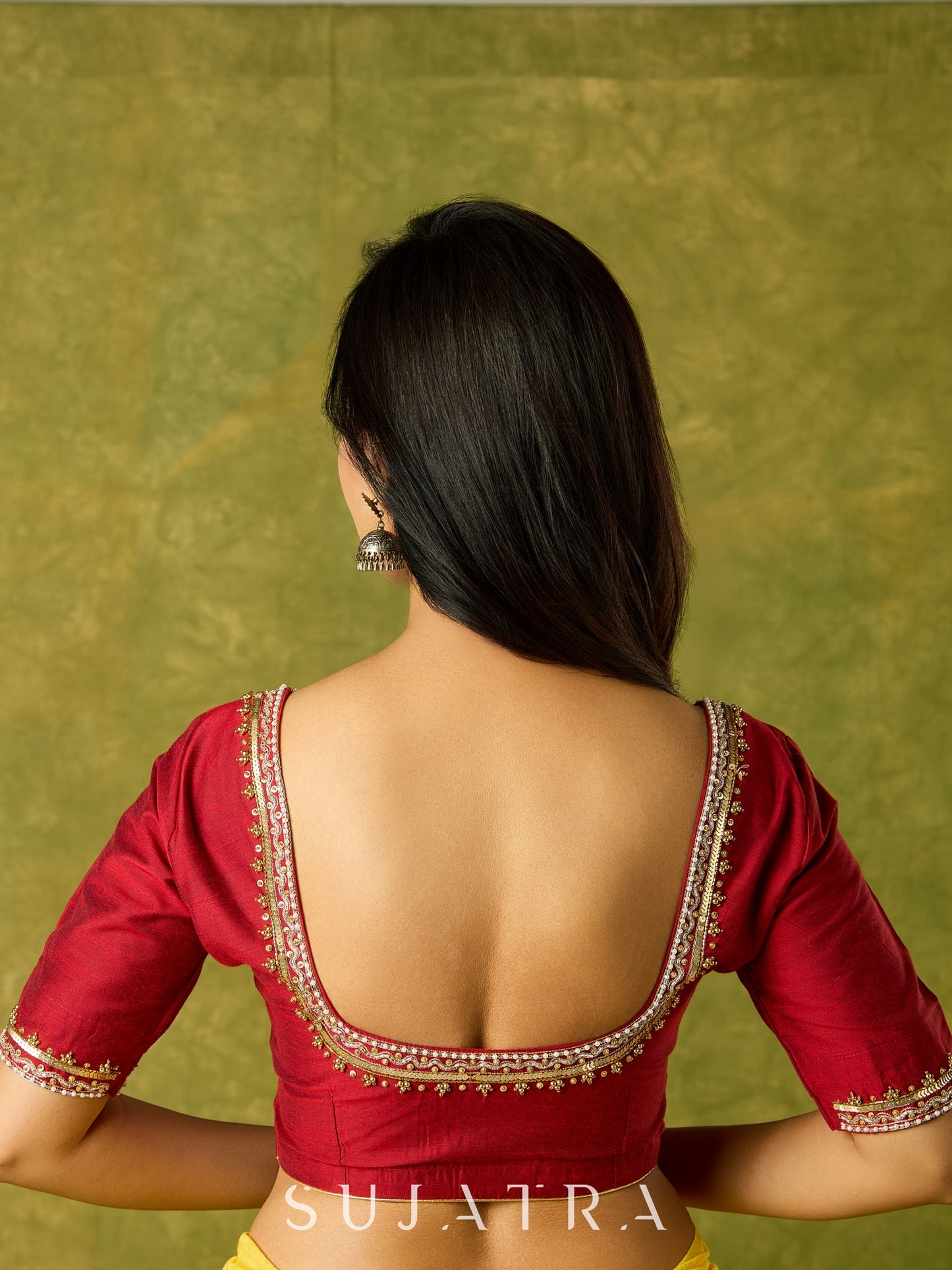 Festive hand embroidered maroon cotton silk blouse.
