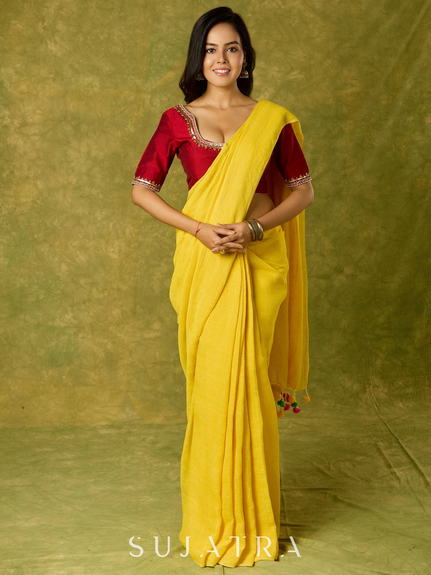 Festive hand embroidered maroon cotton silk blouse.
