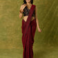 Beautiful black cotton sleeveless blouse with elegant fabric combination .
