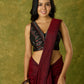Beautiful black cotton sleeveless blouse with elegant fabric combination .