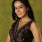 Beautiful black cotton sleeveless blouse with elegant fabric combination .
