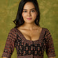 Artfully crafted cotton blouse with rich Ajrakh fabric accents.