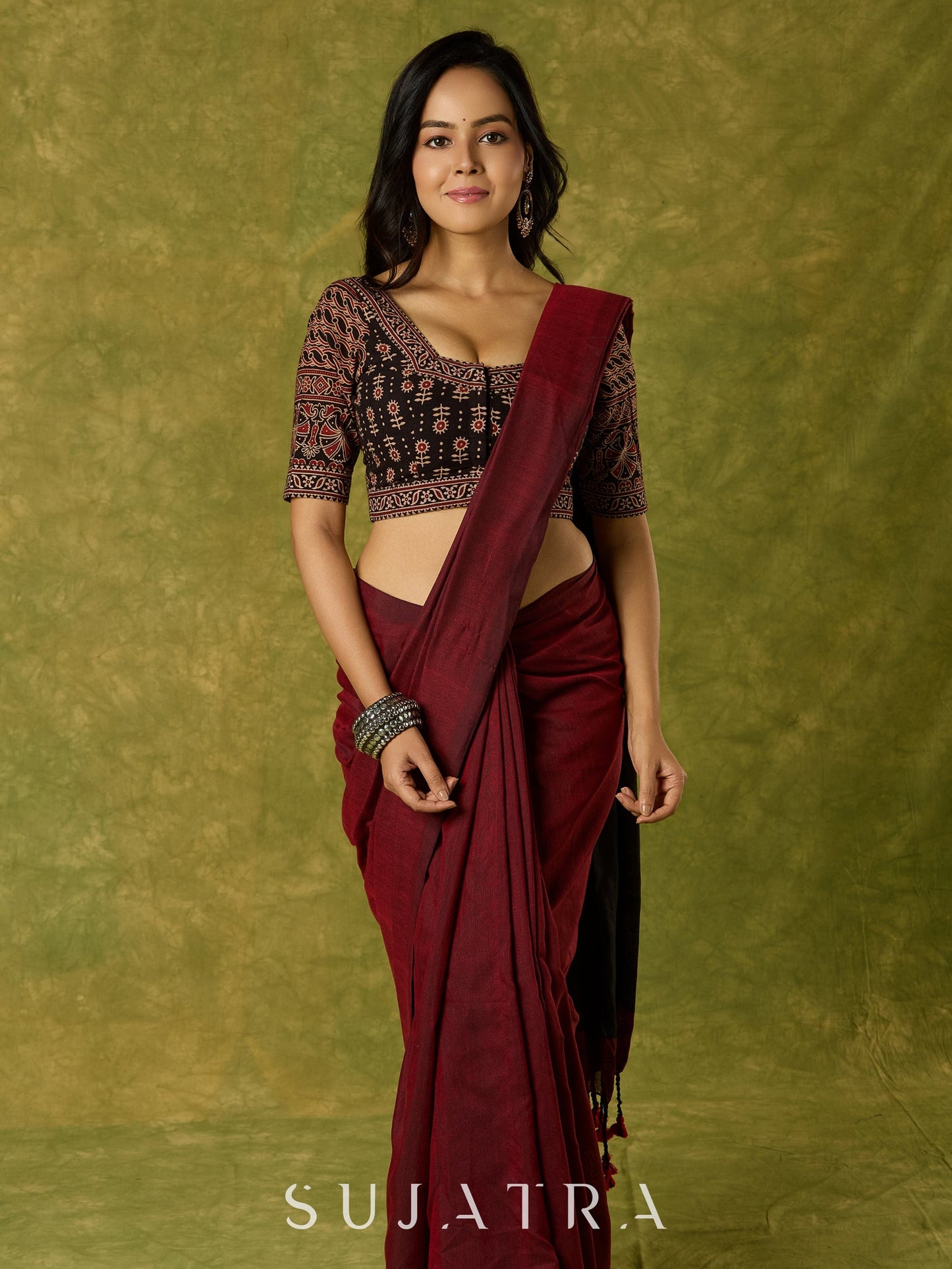 Artfully crafted cotton blouse with rich Ajrakh fabric accents.