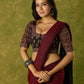 Artfully crafted cotton blouse with rich Ajrakh fabric accents.