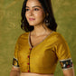 Mustard Banarasi combination blouse with a touch of tradition
