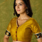 Mustard Banarasi combination blouse with a touch of tradition