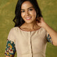 Beige cotton silk blouse beautifully blended with artistic kalamkari detailing.