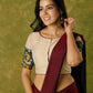 Beige cotton silk blouse beautifully blended with artistic kalamkari detailing.