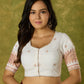 Timeless grace in off-white Jamdani woven blouse.