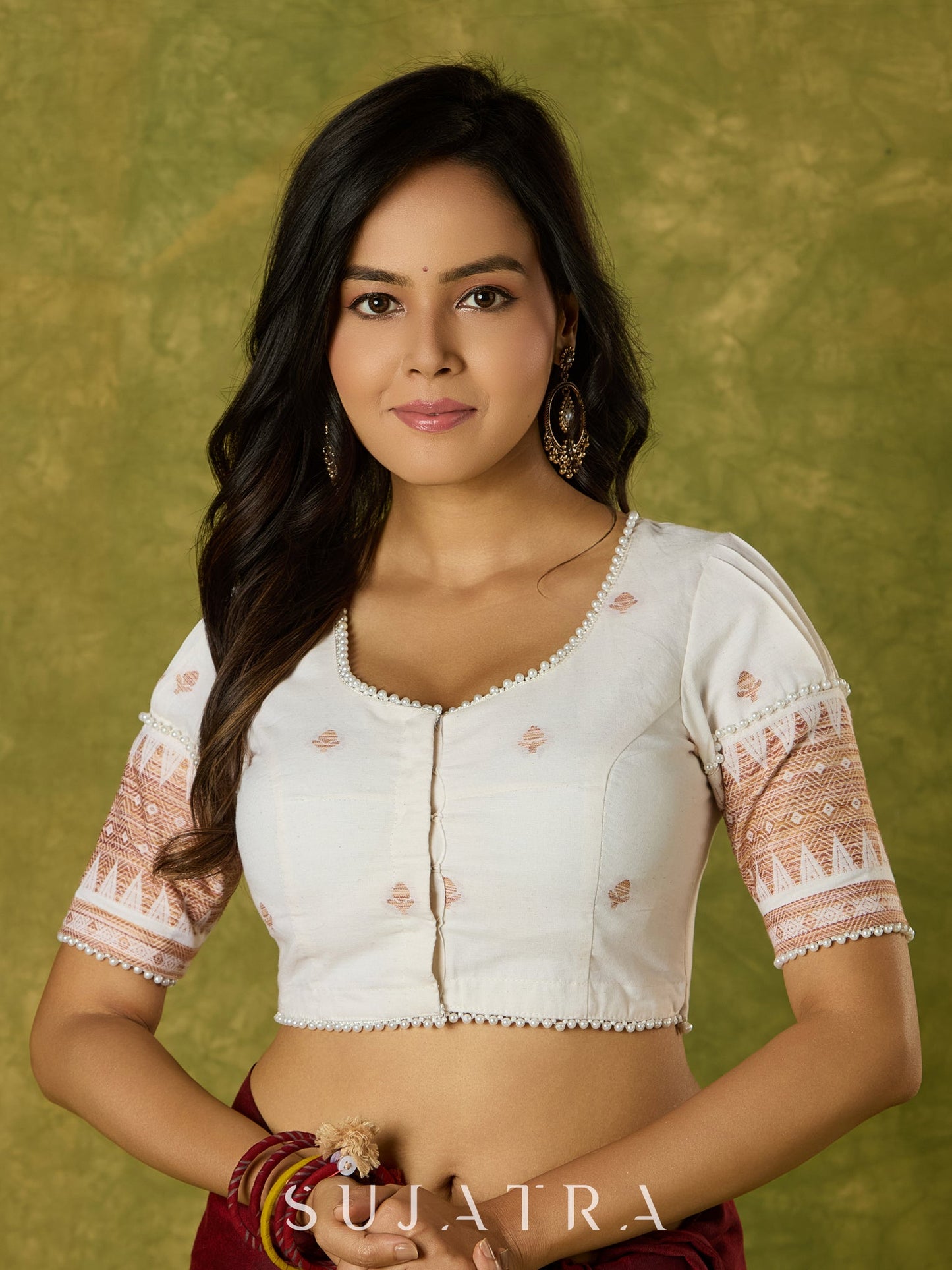 Timeless grace in off-white Jamdani woven blouse.