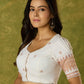 Timeless grace in off-white Jamdani woven blouse.