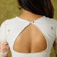 Timeless grace in off-white Jamdani woven blouse.